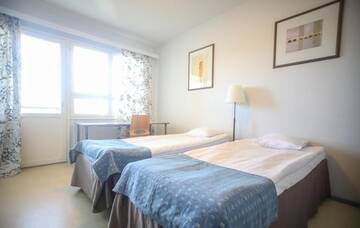 Фото номера Двухместный номер с 2 отдельными кроватями Отель Summer Hotel Vuorilinna г. Савонлинна 11
