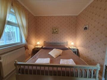 Фото номера Двухместный номер с 1 кроватью Отели типа «постель и завтрак» B&amp;B Lomamokkila г. Савонлинна 6