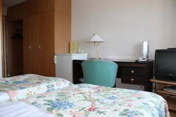 Фото номера Двухместный номер с 2 отдельными кроватями Отель Summer Hotel Tott г. Савонлинна 5