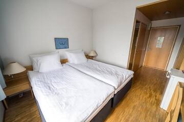 Фото номера Двухместный номер с 2 отдельными кроватями Отель Summer Hotel Tott г. Савонлинна 2